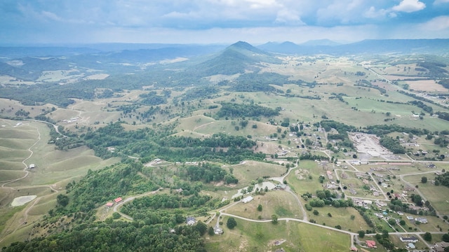 drone / aerial view featuring a mountain view