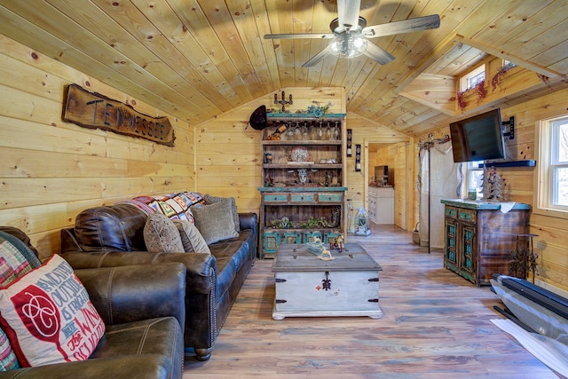 living room featuring wood ceiling, wood-type flooring, and ceiling fan