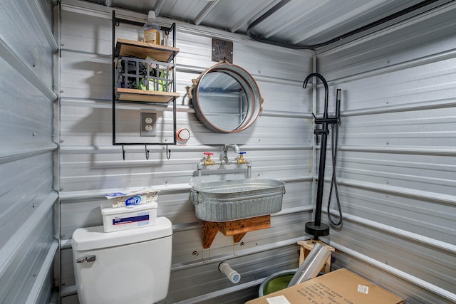 bathroom featuring toilet