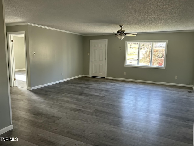 unfurnished room with ceiling fan, crown molding, dark wood-type flooring, and a textured ceiling