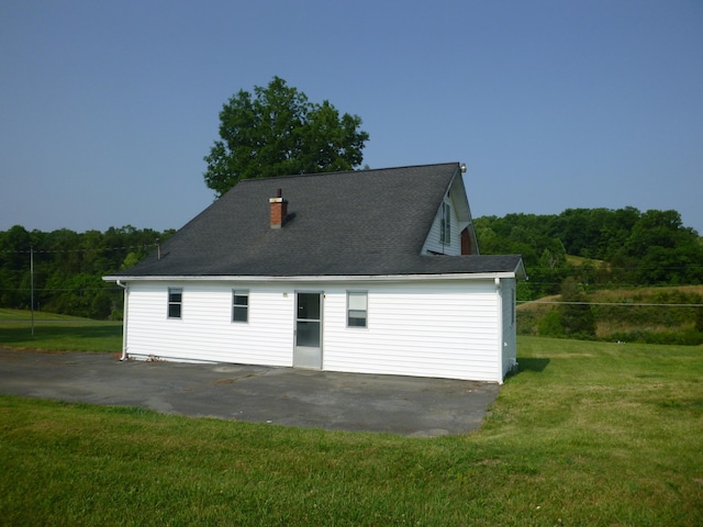 garage featuring a yard