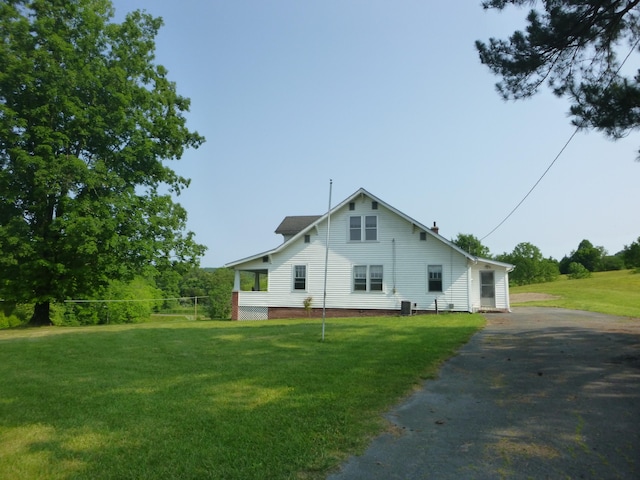 view of front of home with a front yard