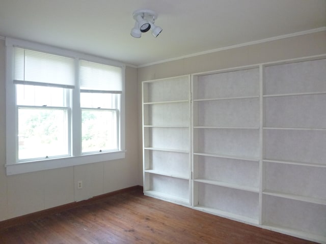 unfurnished room with dark hardwood / wood-style flooring