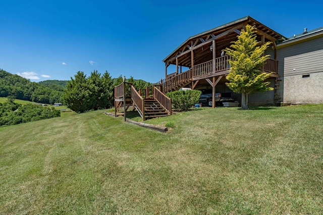 view of yard with a deck