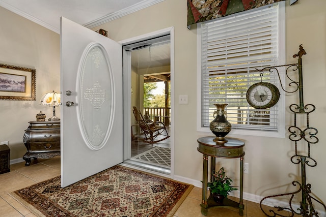 tiled foyer with crown molding