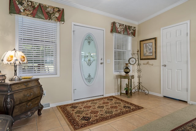 foyer entrance featuring light tile flooring and ornamental molding