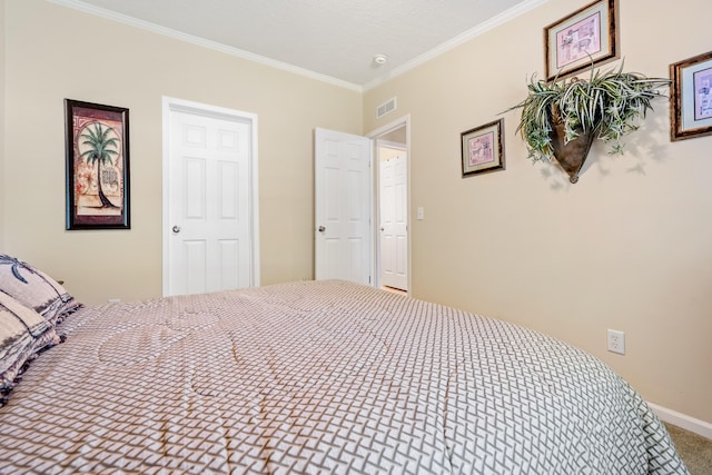 bedroom with crown molding