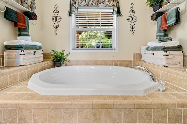 bathroom featuring tiled bath