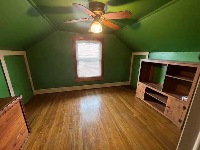 bonus room featuring ceiling fan, vaulted ceiling, and light hardwood / wood-style flooring