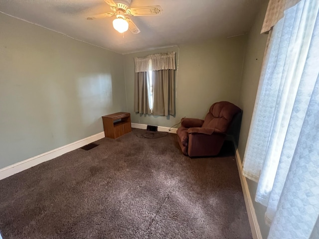 unfurnished room with carpet and ceiling fan