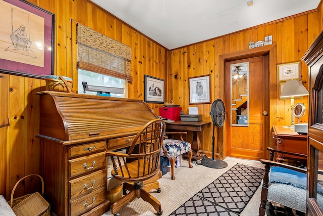 carpeted office with wooden walls