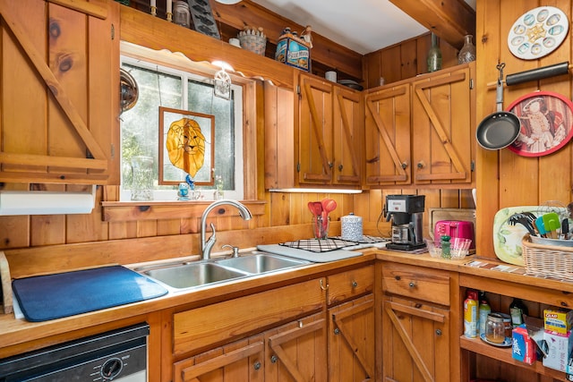 kitchen featuring sink, plenty of natural light, and dishwasher