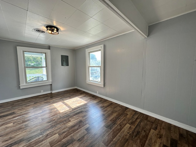 unfurnished room featuring dark hardwood / wood-style floors