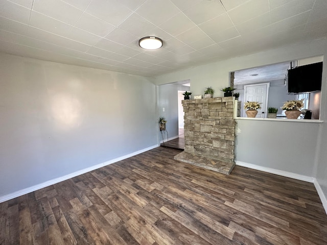 spare room featuring dark hardwood / wood-style floors