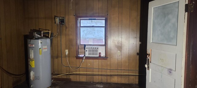 utility room with electric water heater