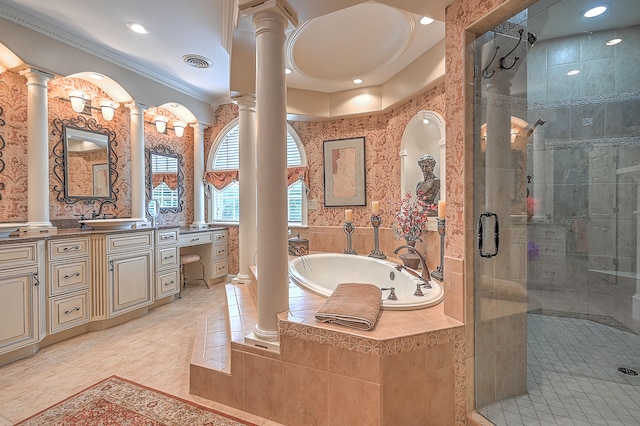 bathroom featuring ornamental molding, ornate columns, tile flooring, plus walk in shower, and vanity