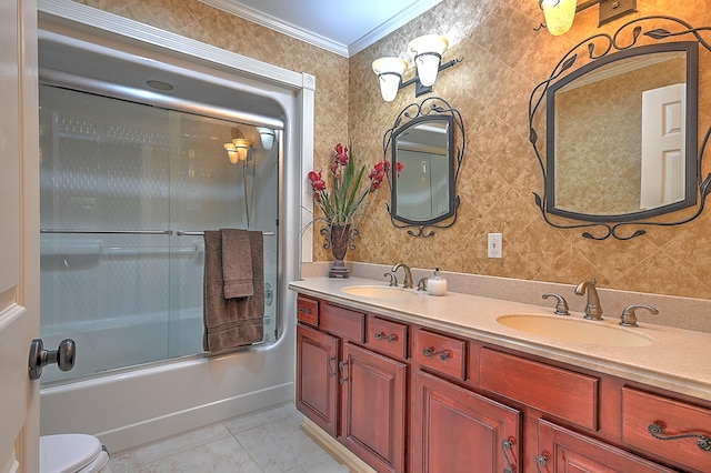 full bathroom with shower / bath combination with glass door, crown molding, toilet, double vanity, and tile floors