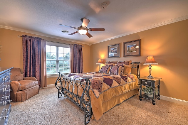 bedroom featuring ceiling fan, crown molding, light carpet, and a textured ceiling