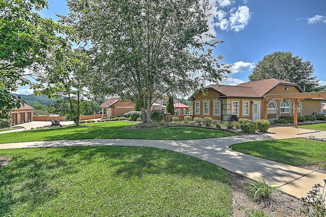 view of front of house with a front lawn