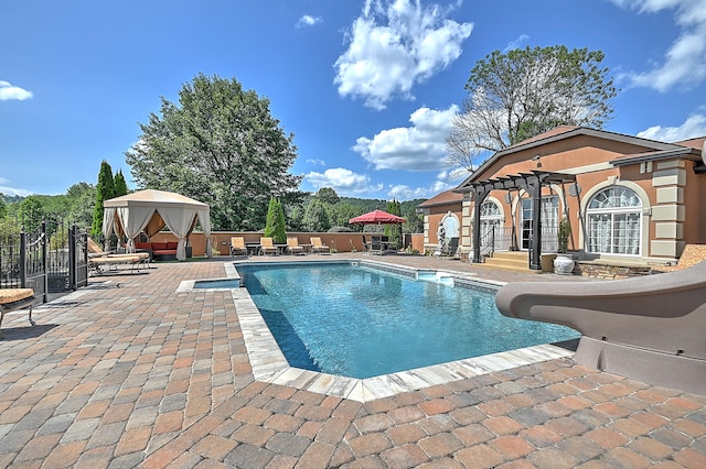 view of swimming pool featuring a patio