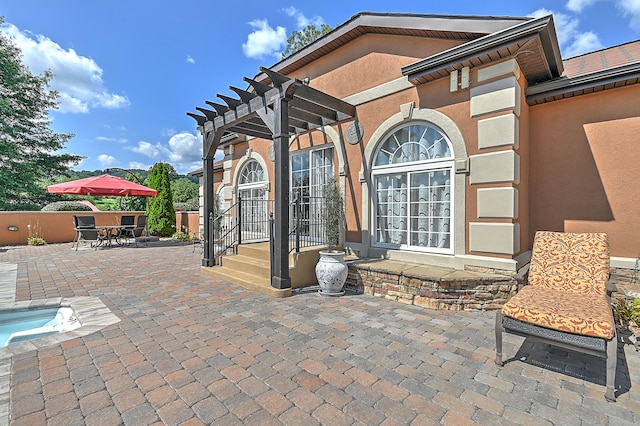 view of terrace with a pergola