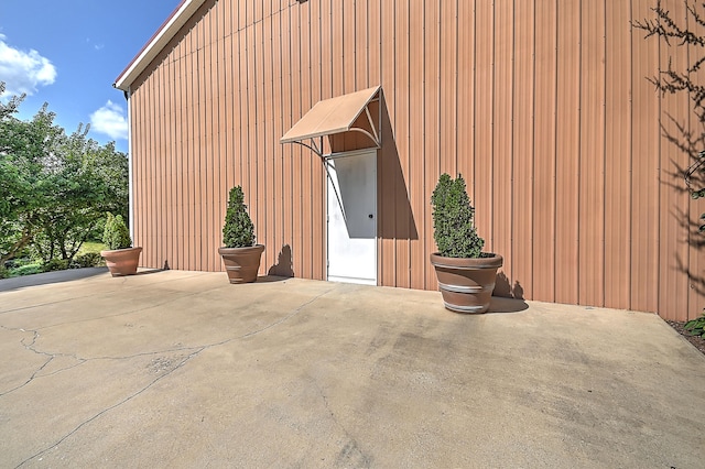 exterior space with wooden walls