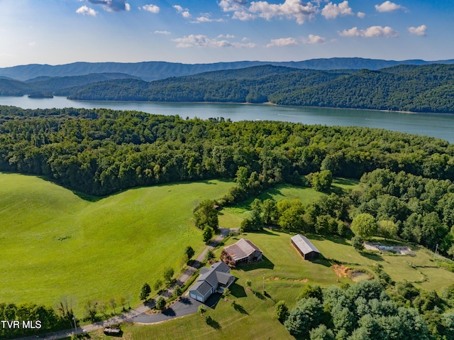 aerial view featuring a water and mountain view