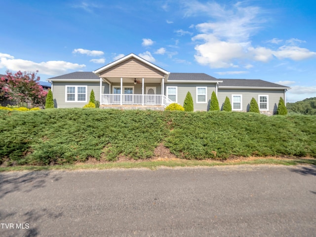 view of front of property featuring covered porch