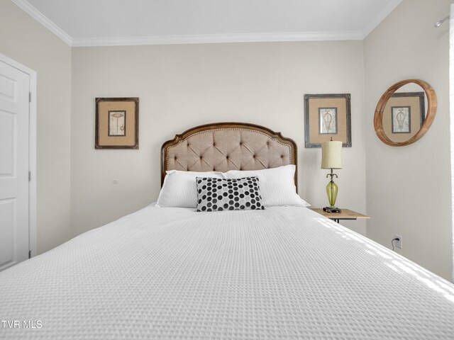 bedroom featuring ornamental molding