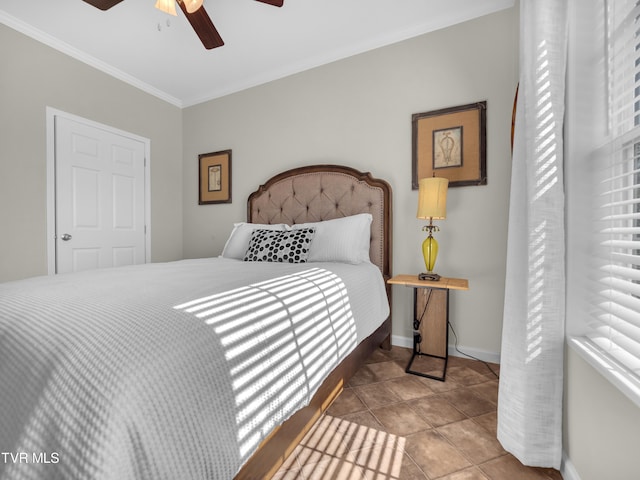 bedroom featuring tile patterned flooring, ceiling fan, and ornamental molding