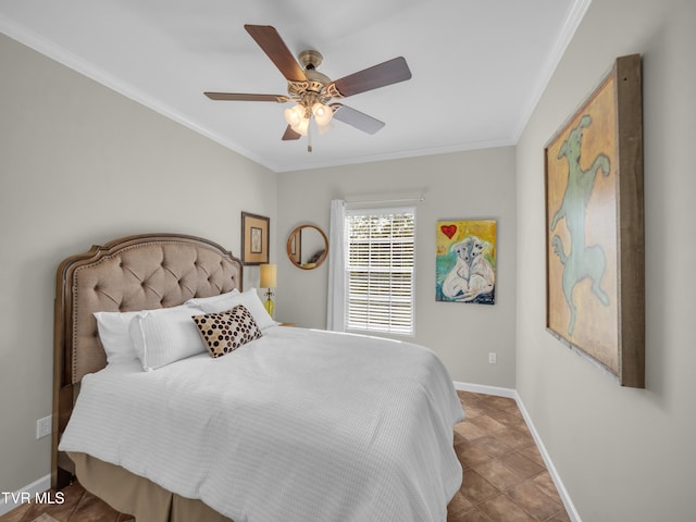 bedroom with ceiling fan and crown molding