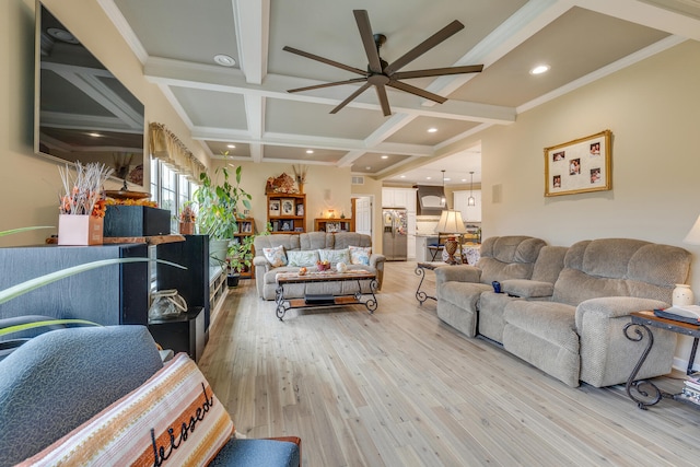 living room with coffered ceiling, ceiling fan, beamed ceiling, crown molding, and light wood-type flooring