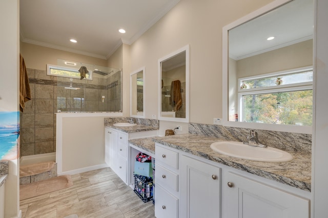 bathroom featuring ornamental molding, vanity, and tile flooring