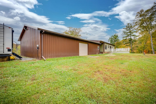 view of yard featuring a garage