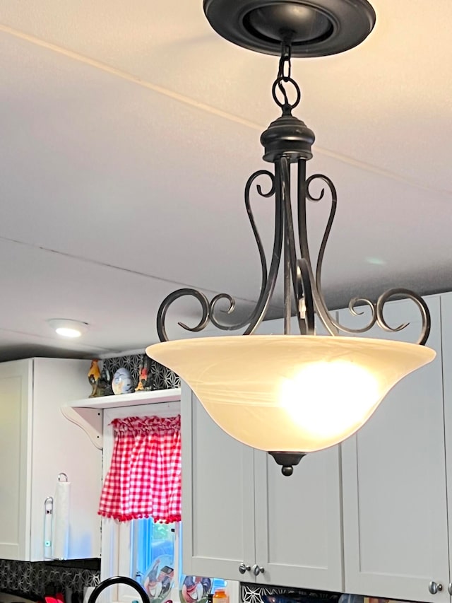 room details featuring white cabinets