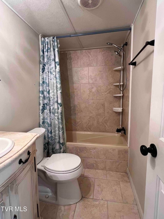 full bathroom with vanity, shower / bathtub combination with curtain, and toilet