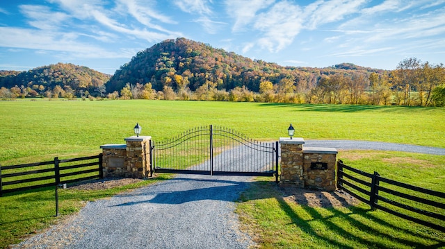 mountain view featuring a rural view