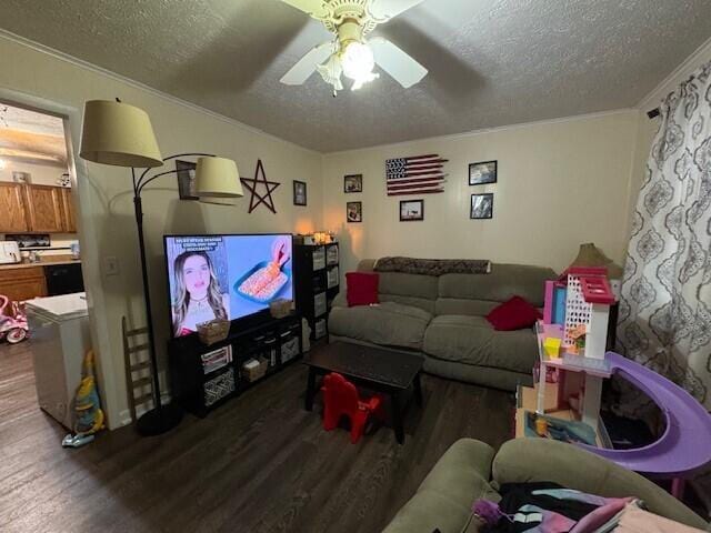 living room with dark hardwood / wood-style floors, a textured ceiling, and ceiling fan