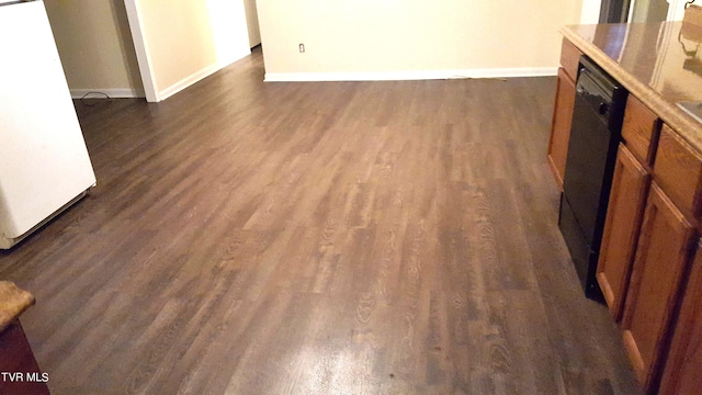 1110 Hickory Flats Rd, Pennington Gap, VA 24277 - unfurnished living room with baseboards and dark wood-style floors