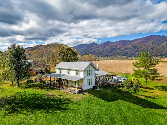 view of mountain feature with a rural view