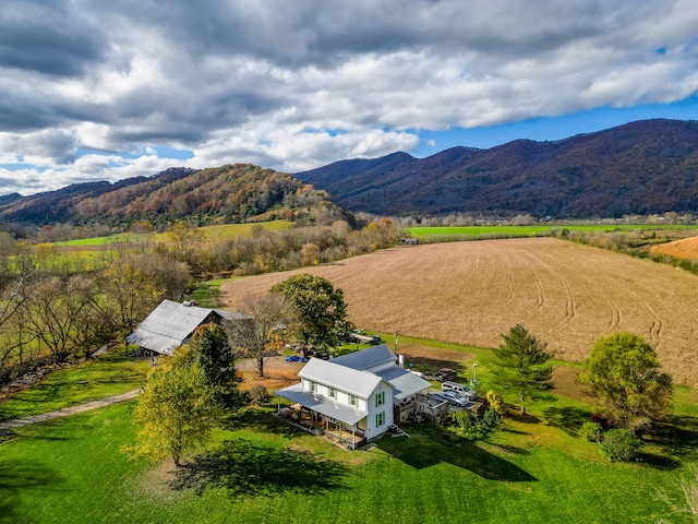 bird's eye view featuring a mountain view and a rural view