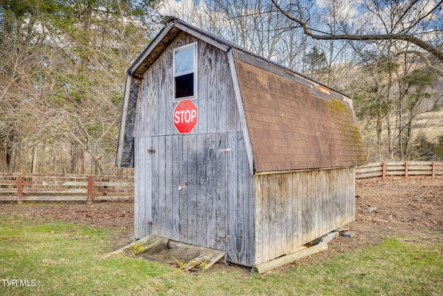 view of shed / structure with a yard