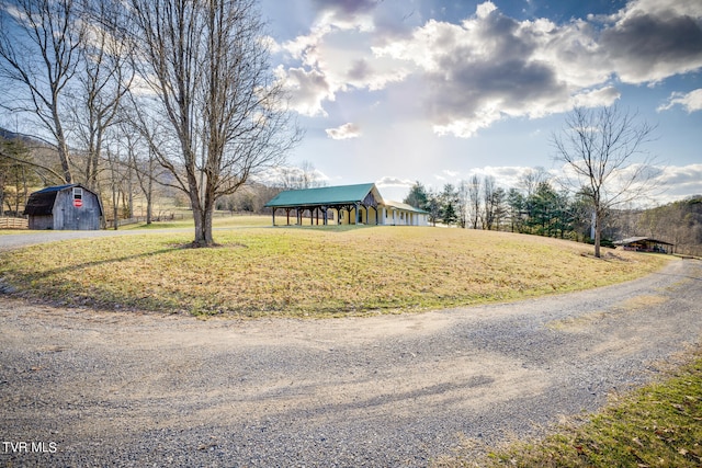 exterior space with a front yard