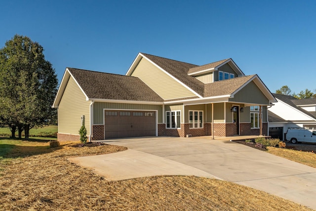 craftsman-style house featuring a porch and a garage