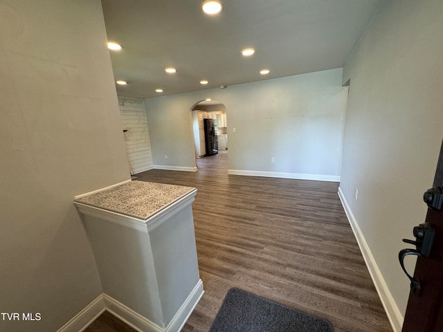 interior space with dark hardwood / wood-style floors