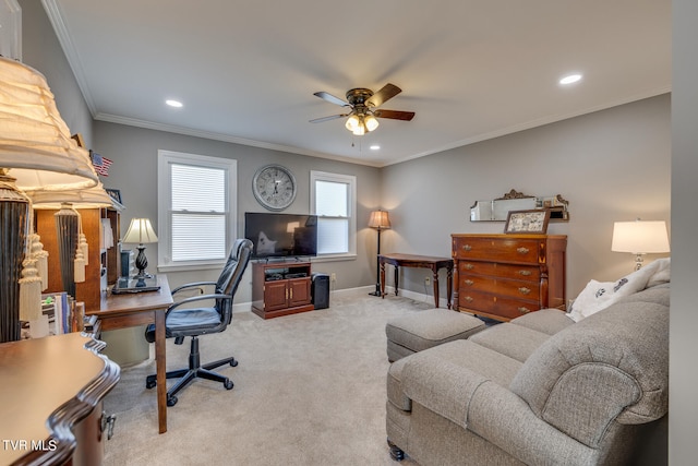 office space with light carpet, crown molding, and ceiling fan