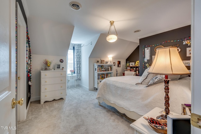 bedroom featuring lofted ceiling and light colored carpet