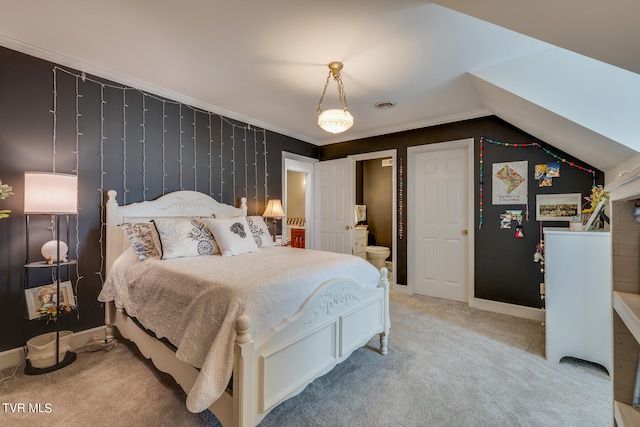 bedroom featuring crown molding, light carpet, and vaulted ceiling