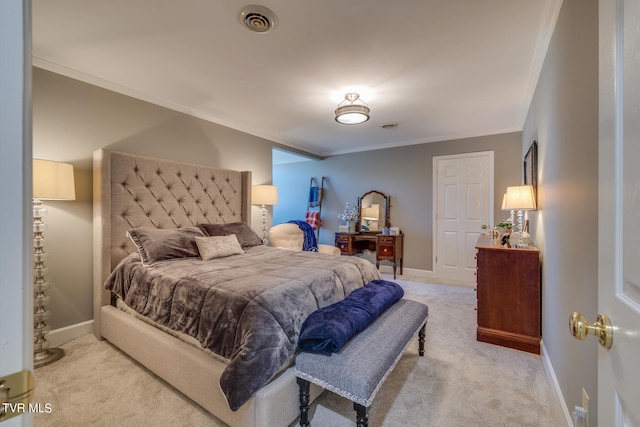 carpeted bedroom with ornamental molding