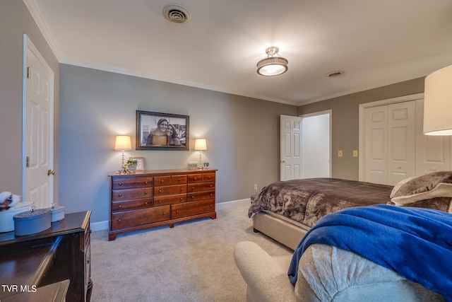 bedroom with crown molding, light carpet, and a closet